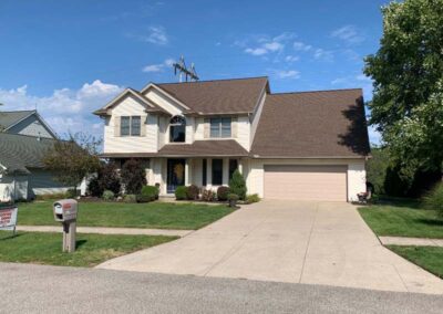 Millcreek, PA two story home with new roof installed by Daugherty Roofing 814.