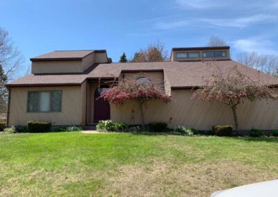 Contemporary home in West Millcreek, PA with new Certainteed roof installed by Daugherty Roofing 814.