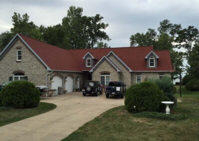 Newer style home with Certainteed roof shingles in Cottage Red installed by Daugherty Roofing 814.