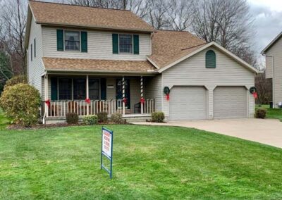 Split-level home in Harbor Creek, PA with new roof installed by Daugherty Roofing 814.