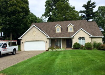 Brick home in Millcreek, PA with new Certainteed shingles installed by Daugherty Roofing 814.