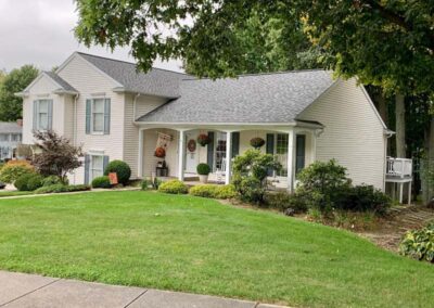 This large home in Millcreek, PA, is shown with a new roof project completed by Daugherty Roofing 814.