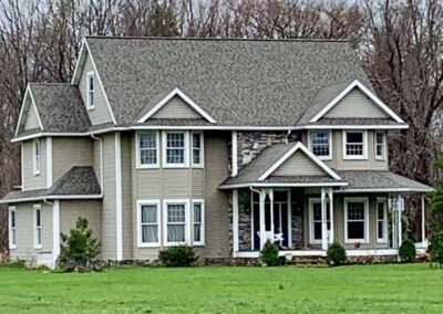 Three story home in Harbor Creek, PA with new roof by Daugherty Roofing 814.